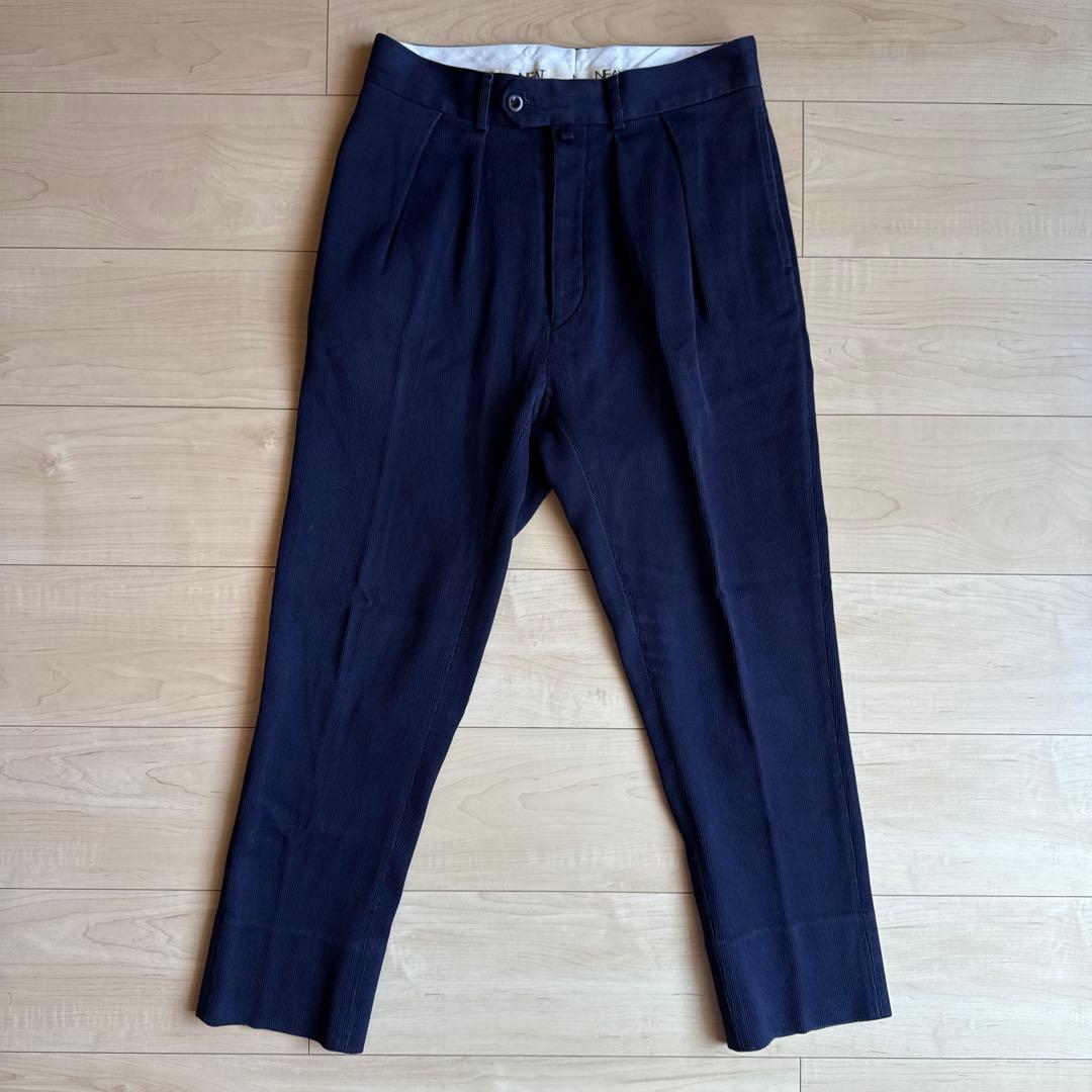 パンツ NEAT COTTON PIQUE TAPERED PANTS