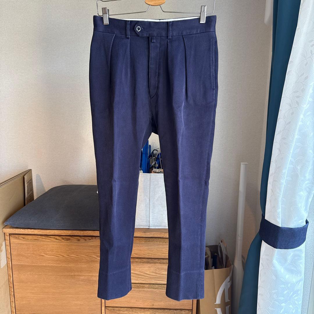 パンツ NEAT COTTON PIQUE TAPERED PANTS