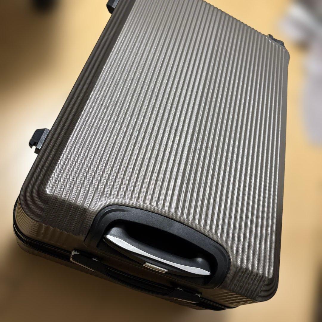 機内持ち込み不可　中サイズスーツケース66×44×27 ブロンズブラウン片道使用