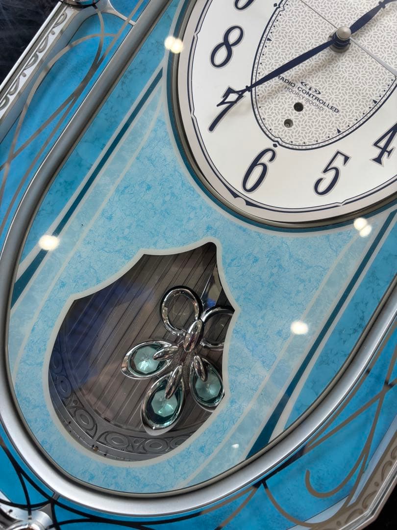 CITIZEN 電波時計 青いオーバル型
