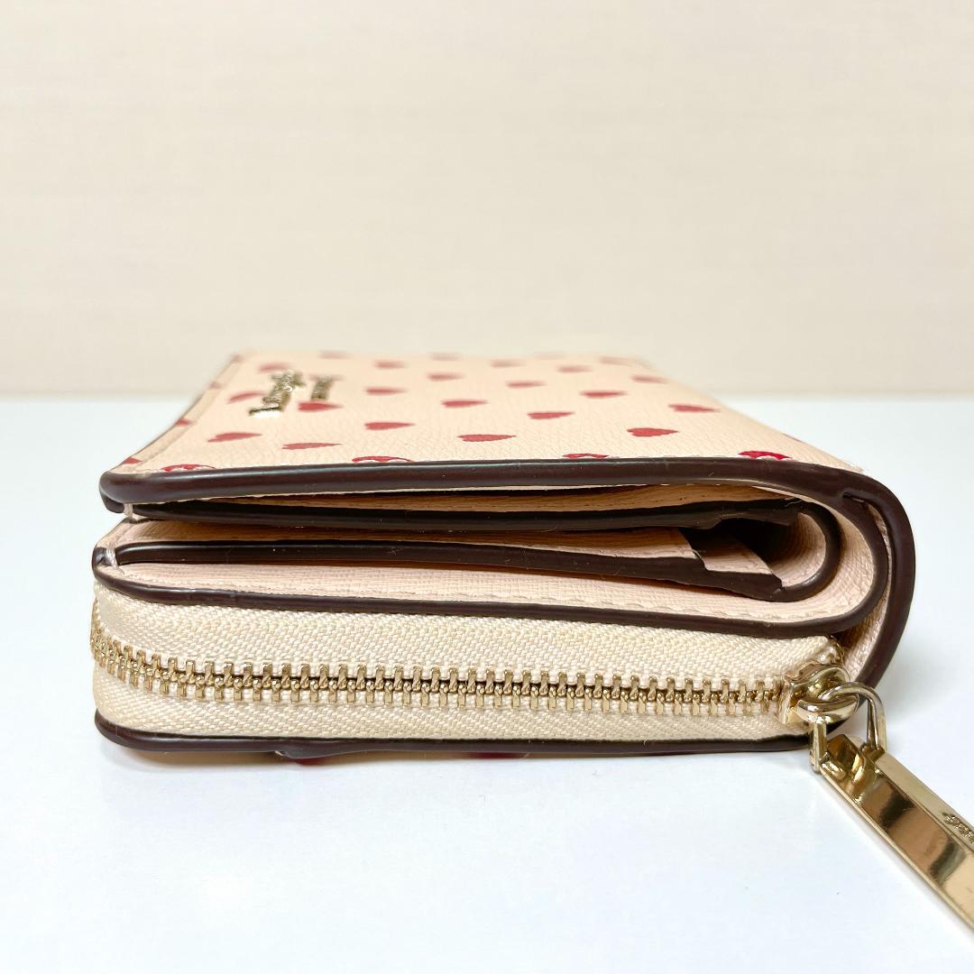 キュートなハート柄❤️kate spade スペンサー　二つ折り財布　ハート