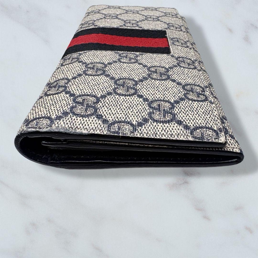 09 GUCCI PVC 二つ折り財布 長財布 シェリーライン k8