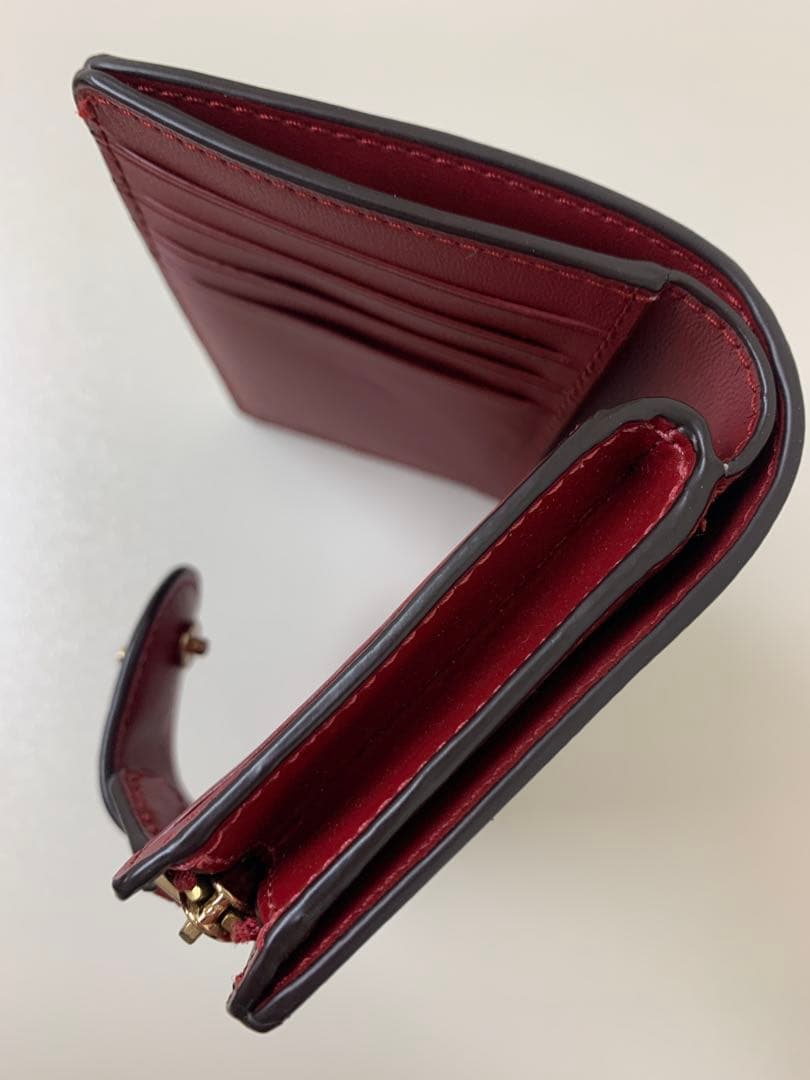 コーチ　二つ折り財布 トゥルーレッド.