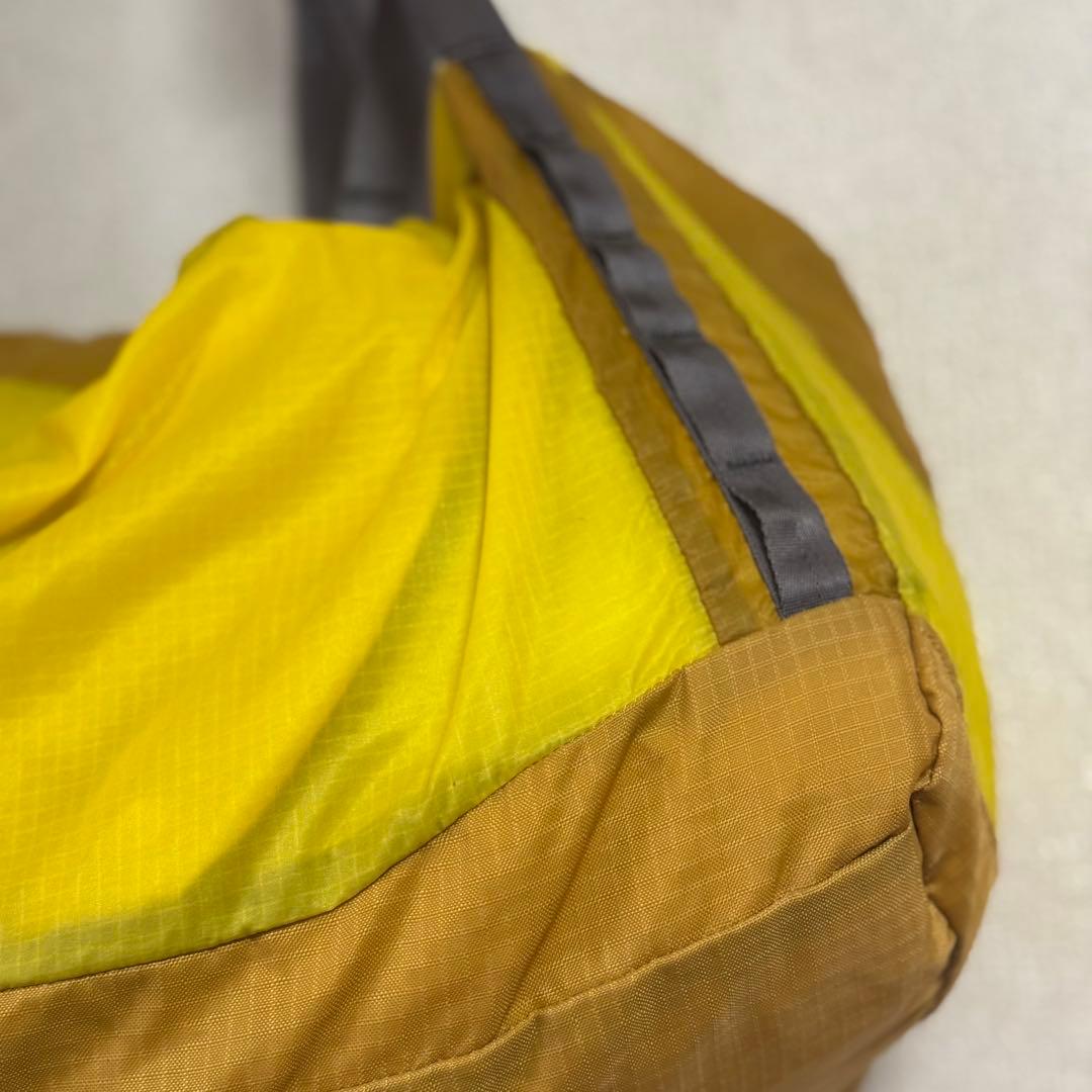 マッスル:Patagonia ライトウェイトトラベルダッフル イエロー