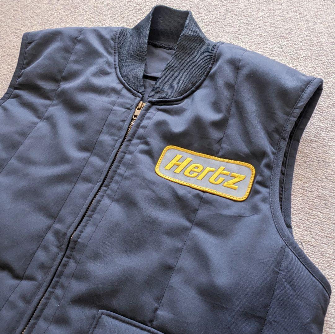 美品 ​USA製 CINTAS ワークベスト Hertz 企業 M 中綿 古着